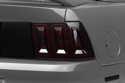 Raxiom 99-04 Ford Mustang Excluding 99-01 Cobra Icon LED Tail Lights- Black Housing (Smoked Lens) - Lights