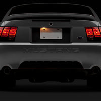 Raxiom 99-04 Ford Mustang Excluding 99-01 Cobra Tail Lights- Black Housing (Smoked Lens) - Lights