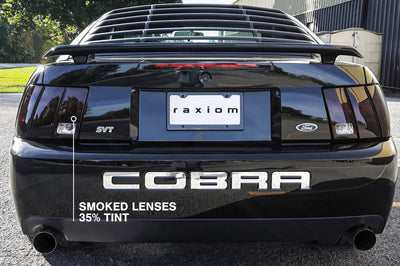 Raxiom 99-04 Ford Mustang Excluding 99-01 Cobra Tail Lights- Black Housing (Smoked Lens) - Lights