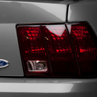 Raxiom 99-04 Ford Mustang Excluding 99-01 Cobra Tail Lights- Black Housing (Smoked Lens) - Lights