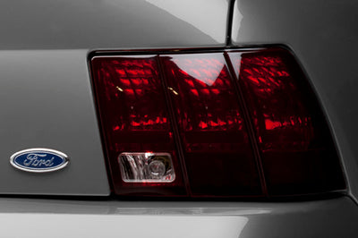 Raxiom 99-04 Ford Mustang Excluding 99-01 Cobra Tail Lights- Black Housing (Smoked Lens) - Lights