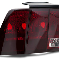 Raxiom 99-04 Ford Mustang Excluding 99-01 Cobra Tail Lights- Black Housing (Smoked Lens) - Lights