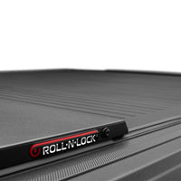 Roll-N-Lock 15-17 Ford F-150 65-5/8in E-Series Retractable Tonneau Cover - Covers
