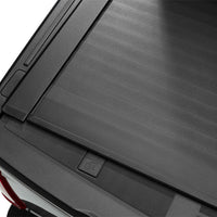 Roll-N-Lock 15-17 Ford F-150 65-5/8in E-Series Retractable Tonneau Cover - Covers