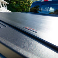 Roll-N-Lock 2019 Chevy Silverado 1500 68-3/8in E-Series Retractable Tonneau Cover - Covers