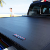 Roll-N-Lock 2019 Chevy Silverado 1500 68-3/8in E-Series Retractable Tonneau Cover - Covers
