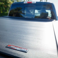 Roll-N-Lock 2020 Chevy Silverado / GMC Sierra 2500-3500 77-3/8in E-Series Retractable Tonneau Cover - Covers