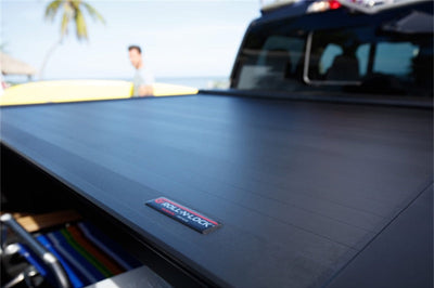 Roll-N-Lock 2020 Chevy Silverado / GMC Sierra 2500-3500 77-3/8in E-Series Retractable Tonneau Cover - Covers
